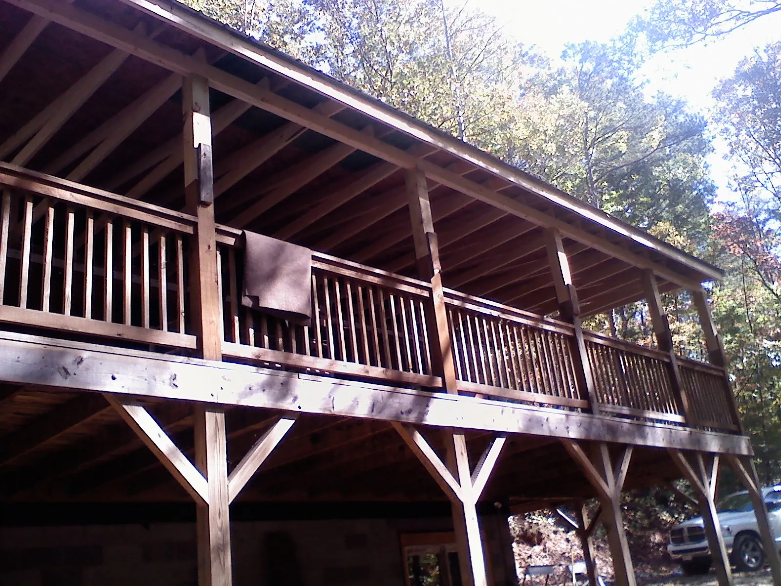 Timber framing under a new elevated porch and deck — Roof Leak Repair in San Bruno by Roofing Brothers